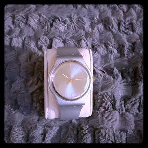 Sleek, Silver Swatch Watch Silver Face, Gold hands